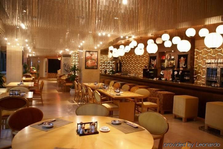 New Century Grand Hotel Kajfeng Étterem fotó